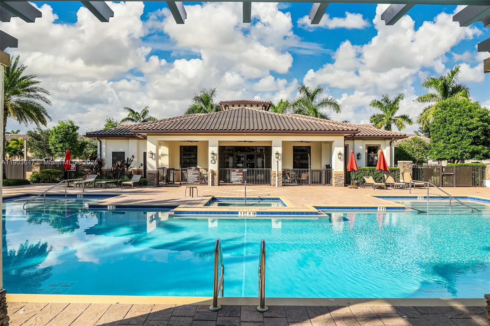 15097 Southwest 115th Street Miami, FL 33196 - Photo 37 of 44 a view of a house with swimming pool and a yard