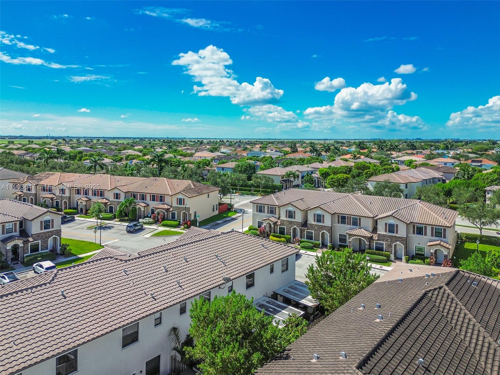 15097 Southwest 115th Street Miami, FL 33196 - Photo 43 of 44 a view of a city from a terrace