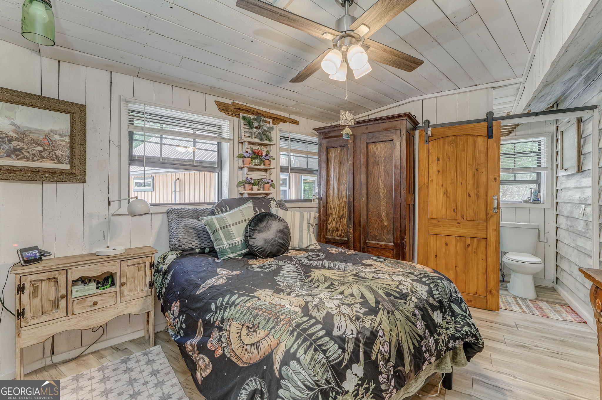 7896 Old State Road Menlo, GA 30731 - Photo 30 of 79 a bedroom with a bed next to a window with the outer view