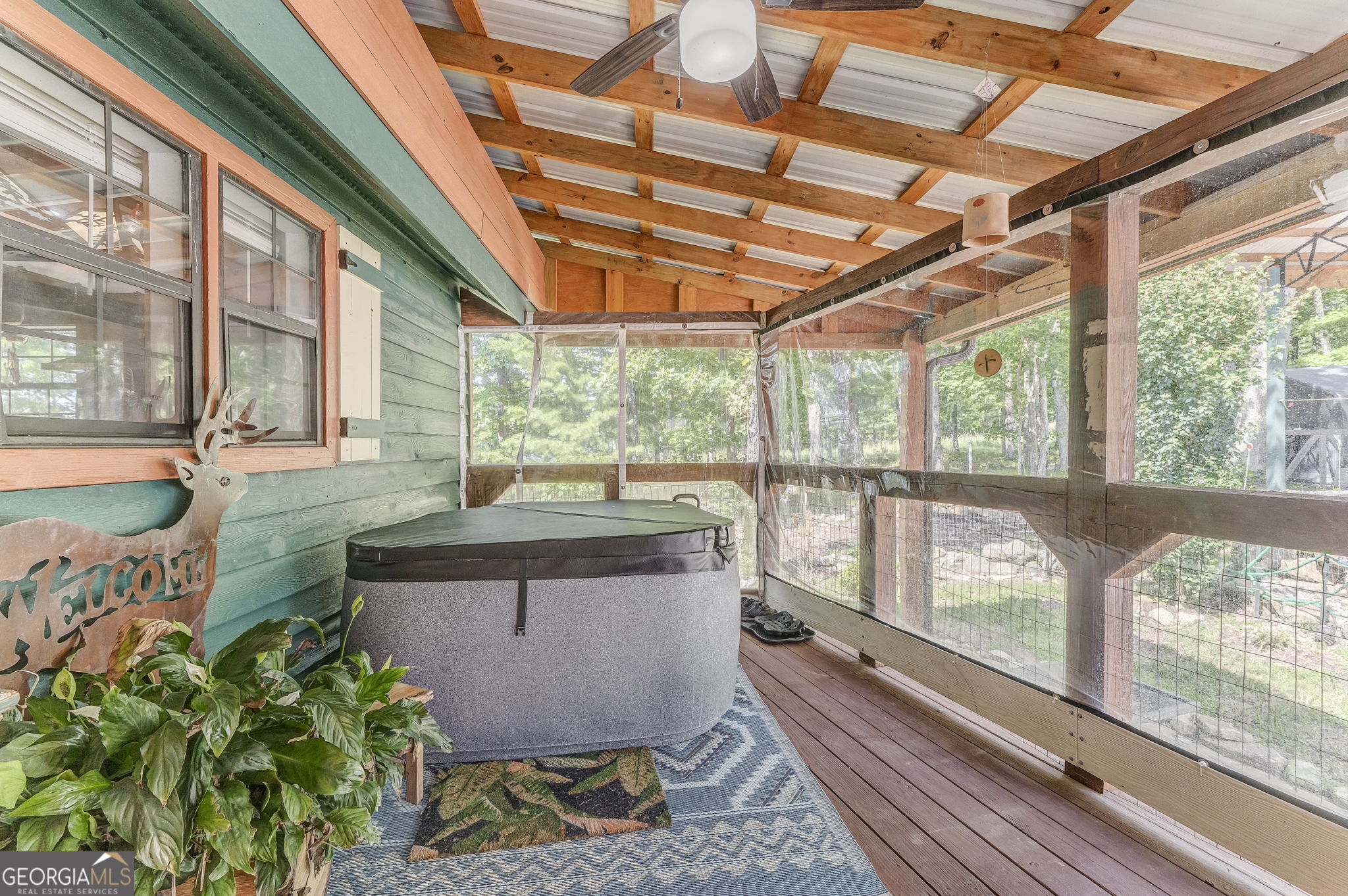7896 Old State Road Menlo, GA 30731 - Photo 48 of 79 a room with patio outdoor furniture and a potted plant