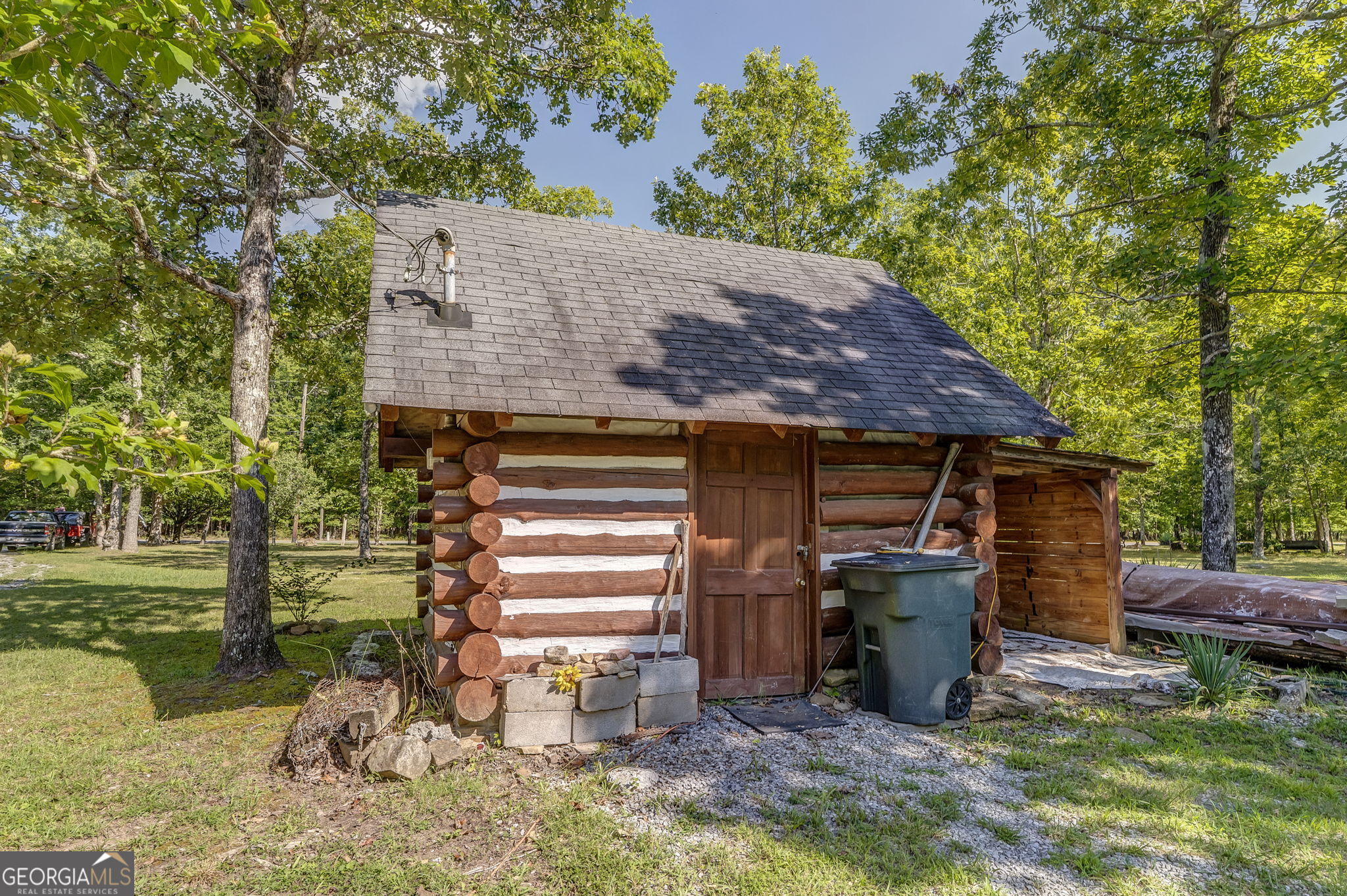 7896 Old State Road Menlo, GA 30731 - Photo 77 of 79 a view of a house with backyard and sitting area