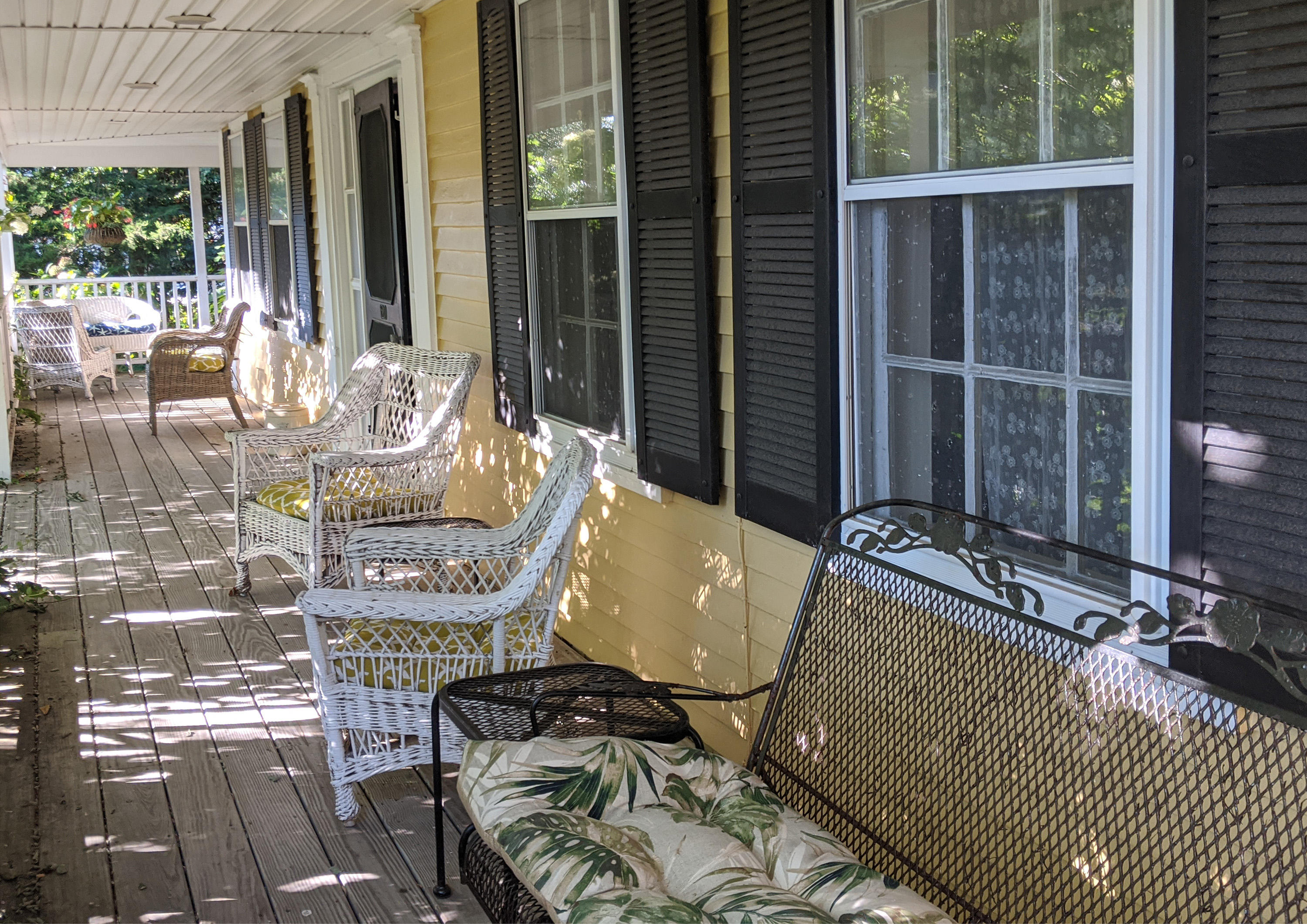 120 Bridge Road Eastham, MA 02642 - Photo 17 of 48 a view of balcony with two chairs and a potted plant