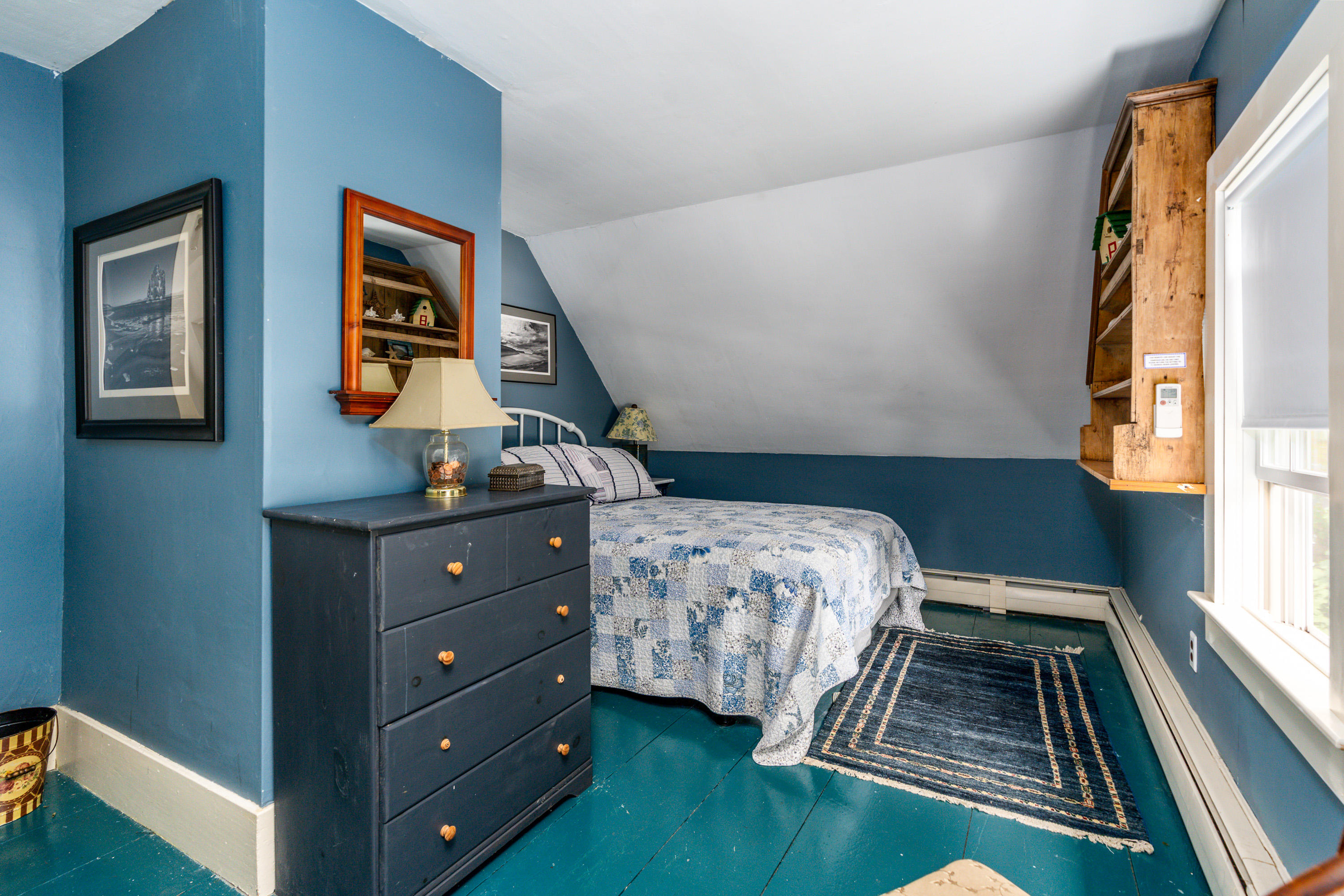 120 Bridge Road Eastham, MA 02642 - Photo 19 of 48 a bedroom with a bed and wooden floor