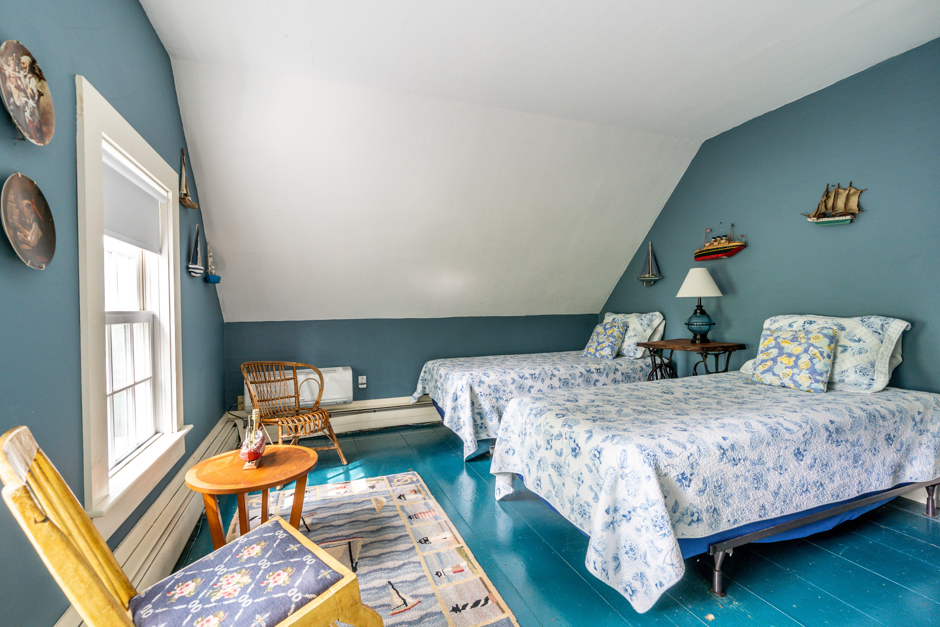 120 Bridge Road Eastham, MA 02642 - Photo 22 of 48 a bedroom with a bed and wooden floor