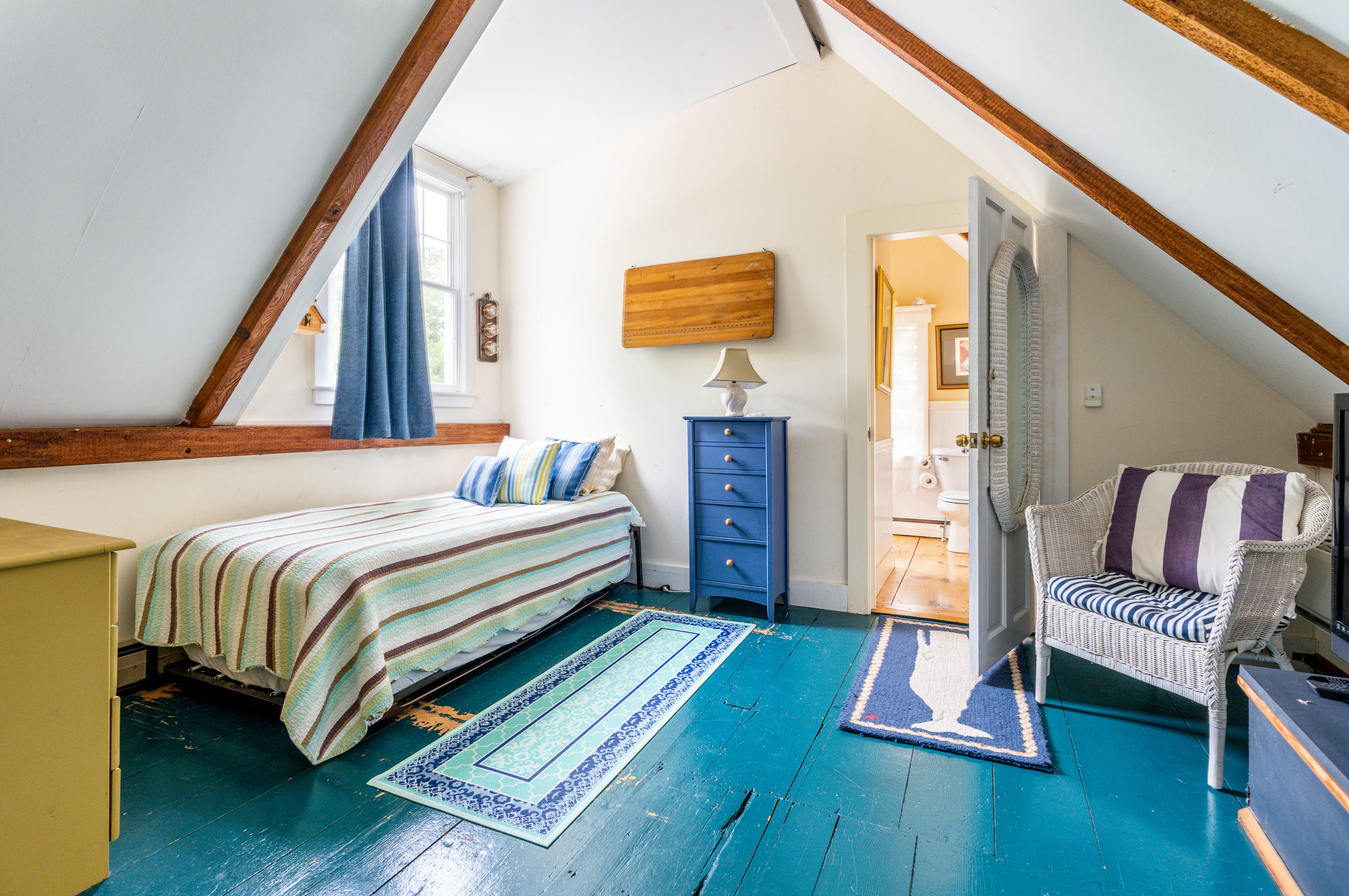 120 Bridge Road Eastham, MA 02642 - Photo 23 of 48 a bedroom with a bed and dresser