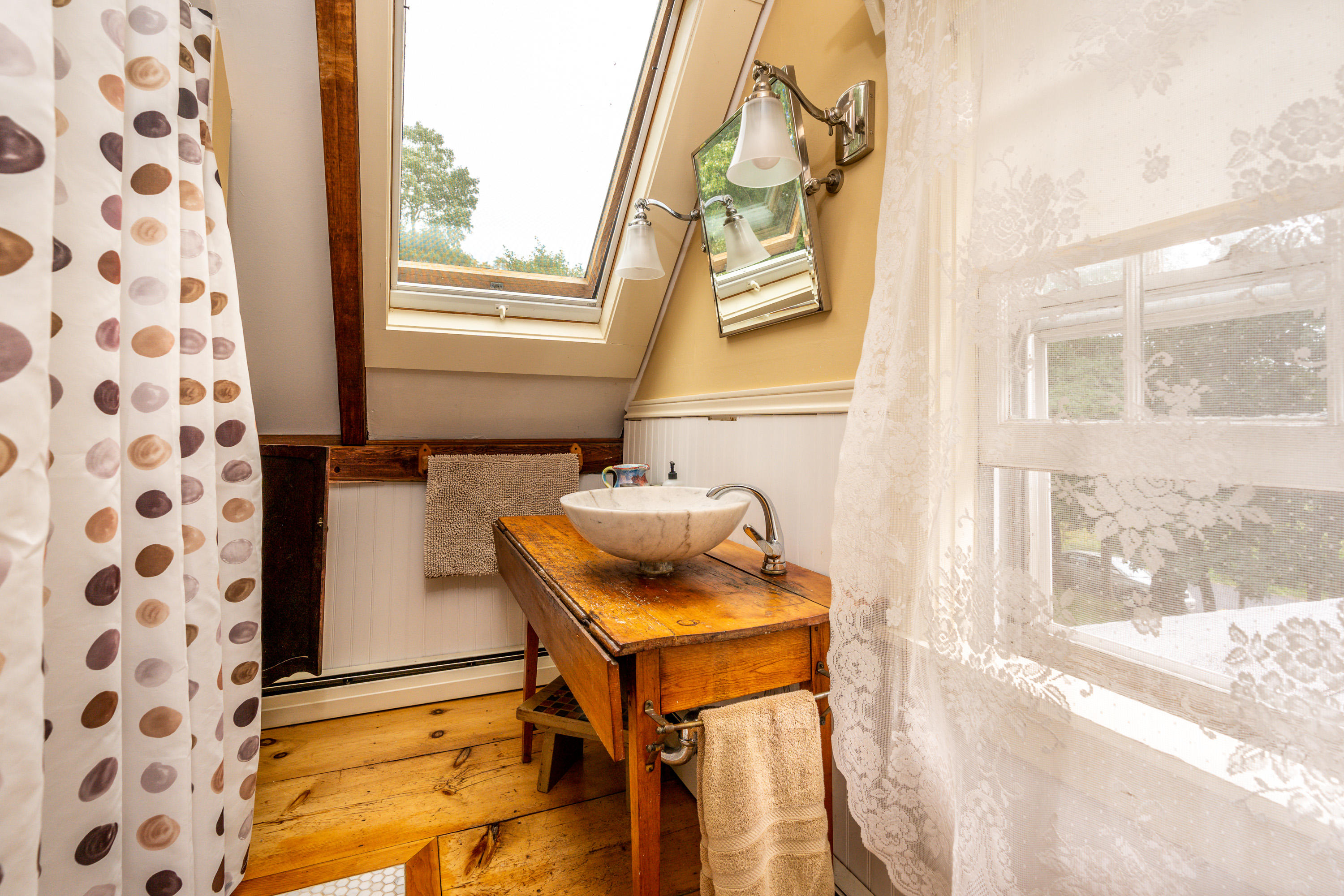 120 Bridge Road Eastham, MA 02642 - Photo 24 of 48 a bathroom with a sink and a mirror