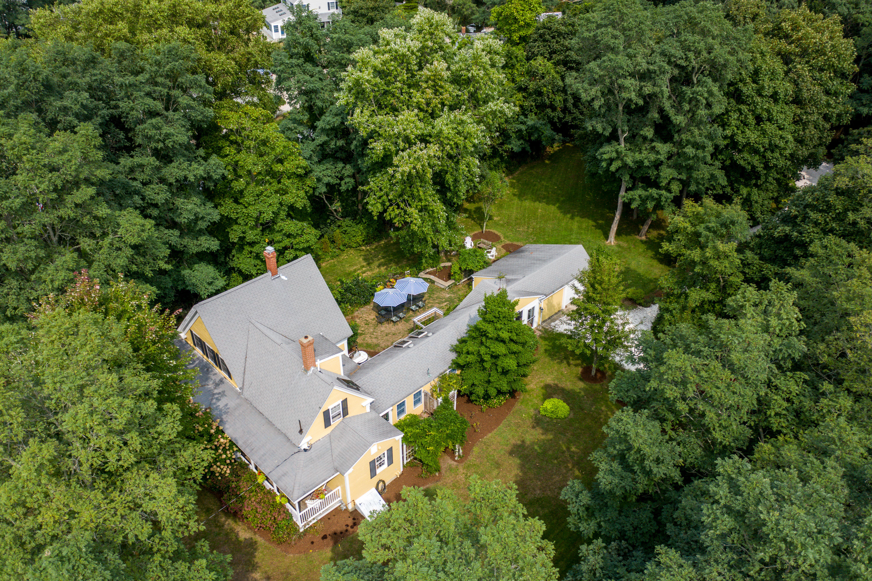 120 Bridge Road Eastham, MA 02642 - Photo 34 of 48 an aerial view of a house with a yard and lake view