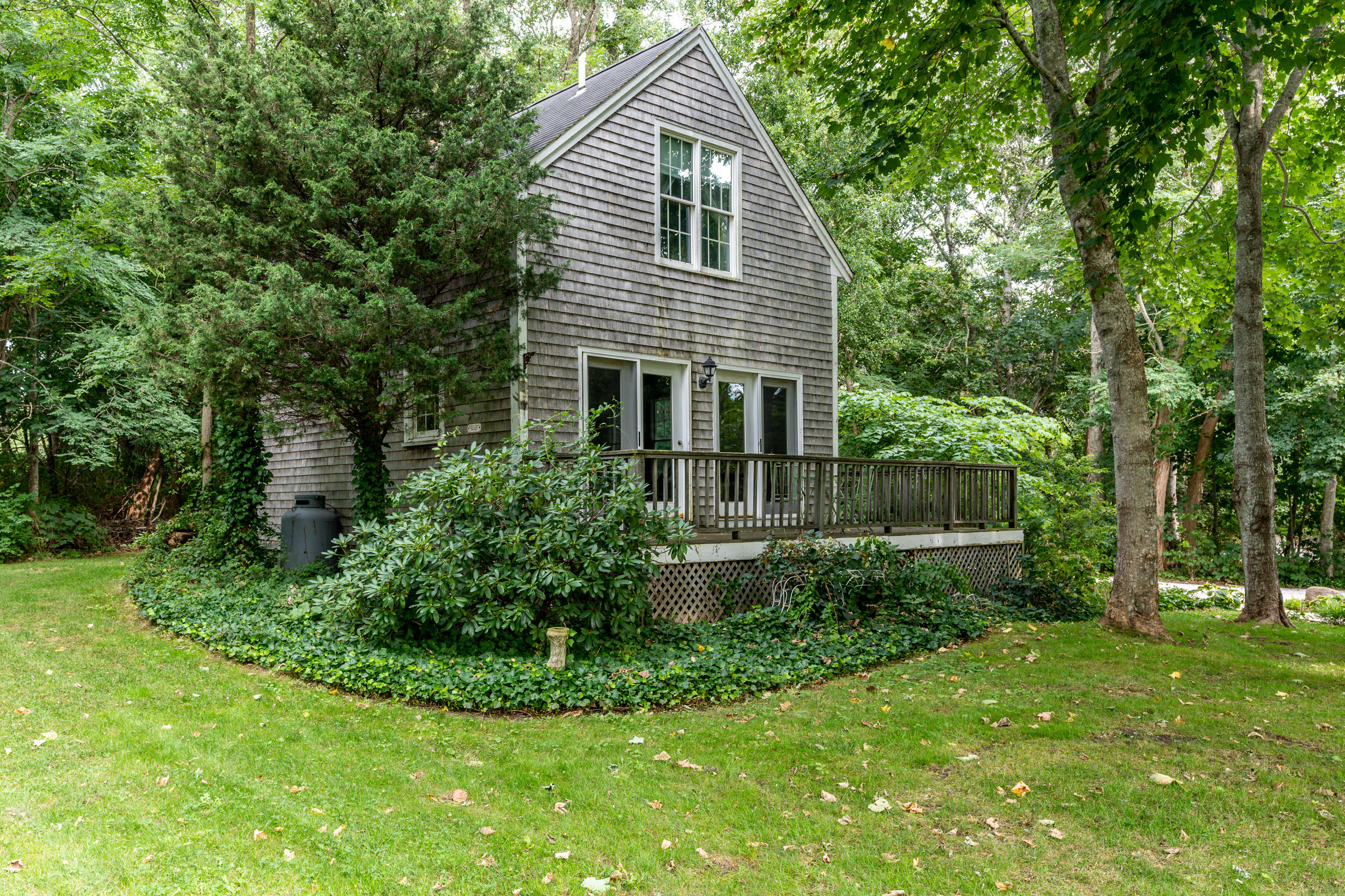 120 Bridge Road Eastham, MA 02642 - Photo 44 of 48 a front view of house with a garden