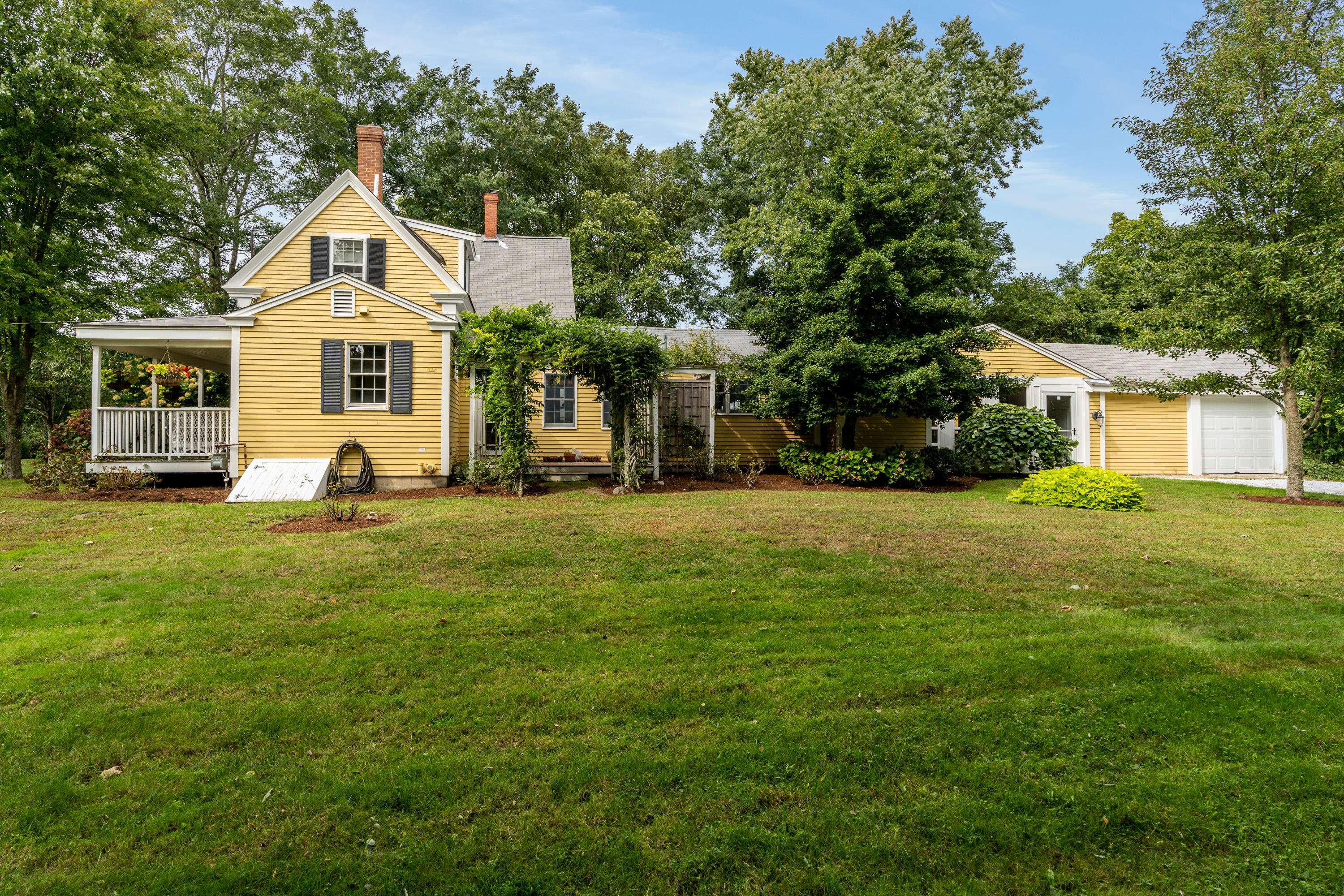 120 Bridge Road Eastham, MA 02642 - Photo 5 of 48 a front view of a house with a yard