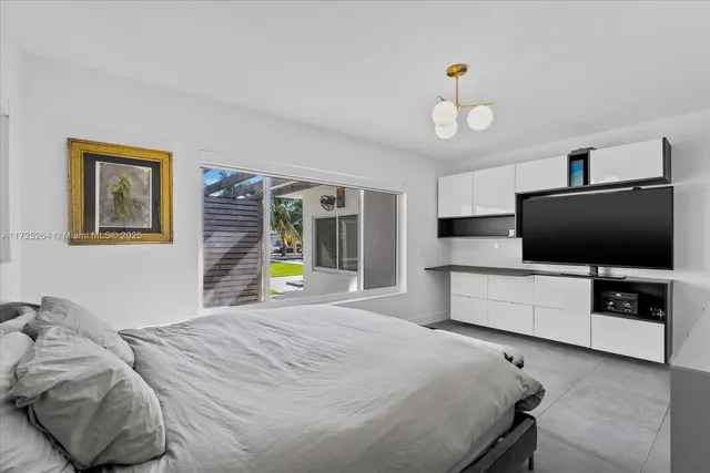 a bathroom with a toilet and a sink
