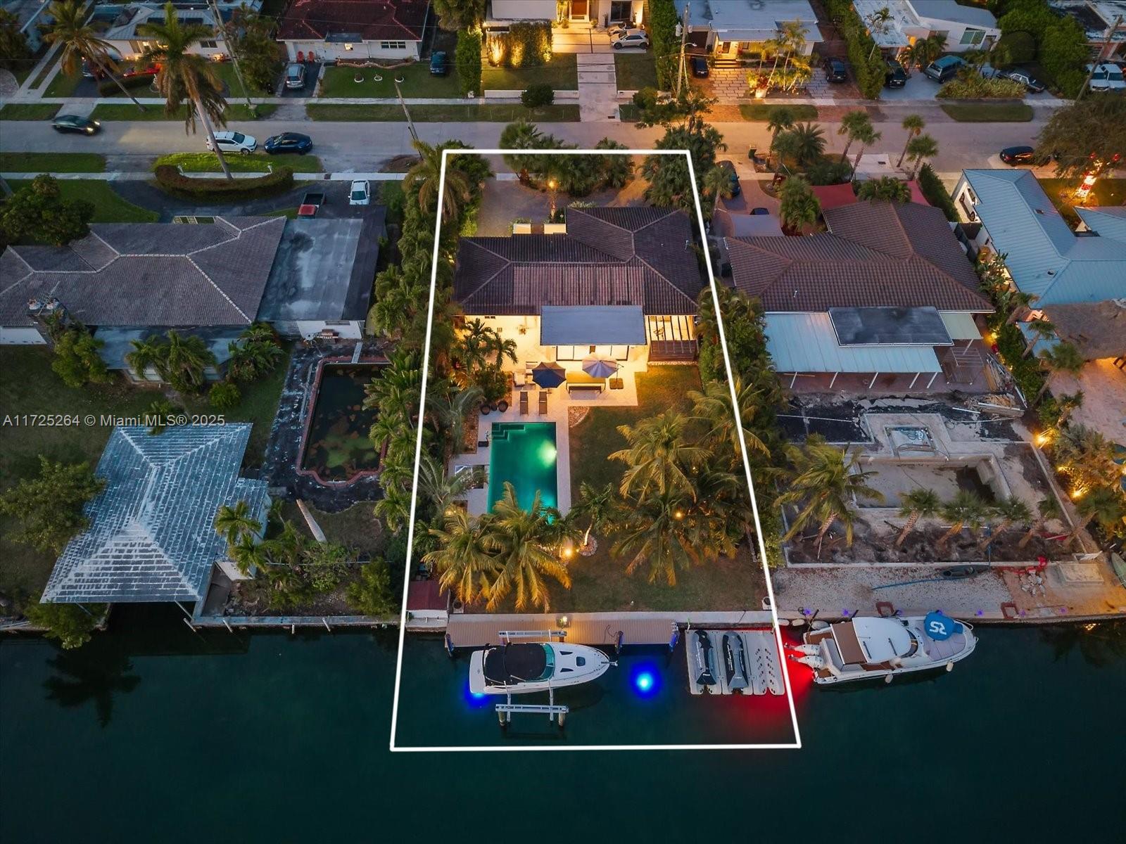 2104 Northeast 124th Street North Miami, FL 33181 - Photo 24 of 26 an aerial view of houses with a yard