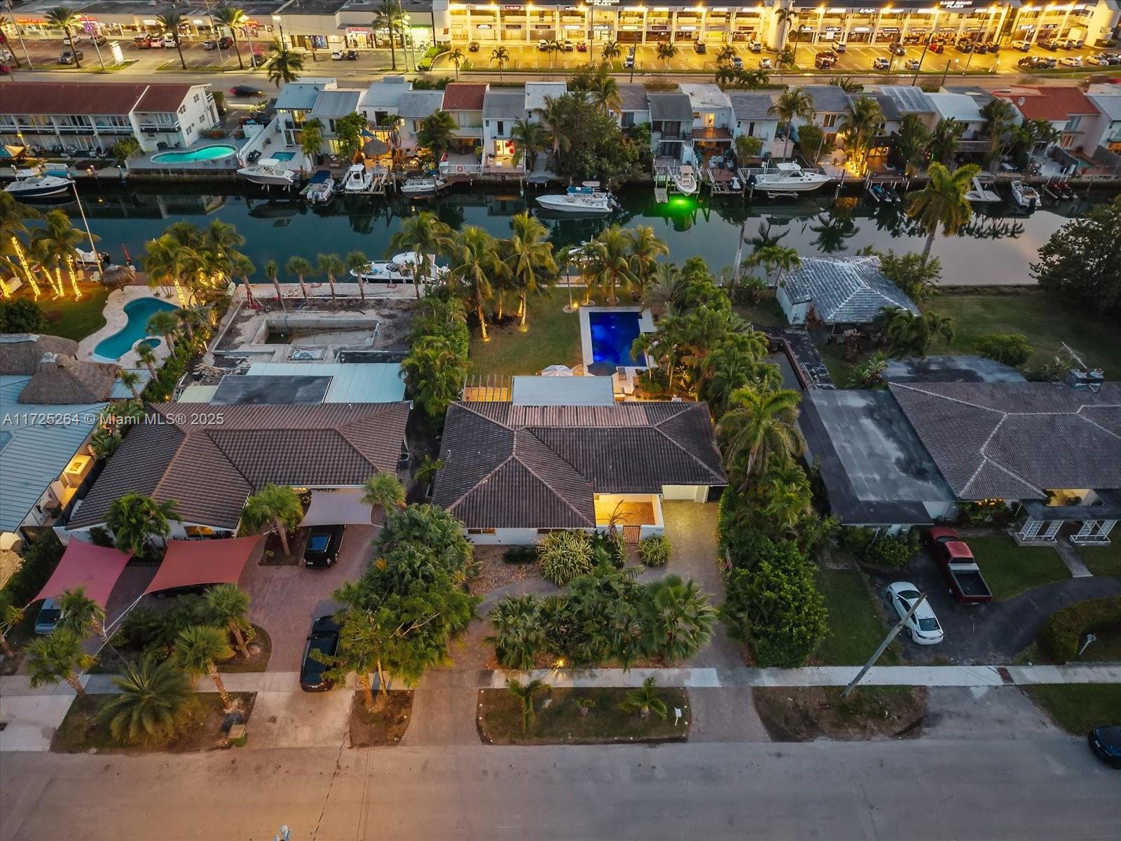 2104 Northeast 124th Street North Miami, FL 33181 - Photo 25 of 26 an aerial view of a houses with outdoor space