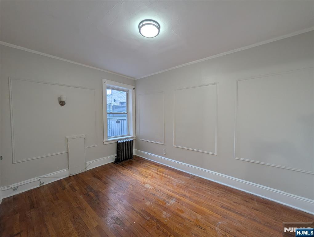 85 Anderson Street, Unit C6 Hackensack, NJ 07601 - Photo 3 of 10 an empty room with windows