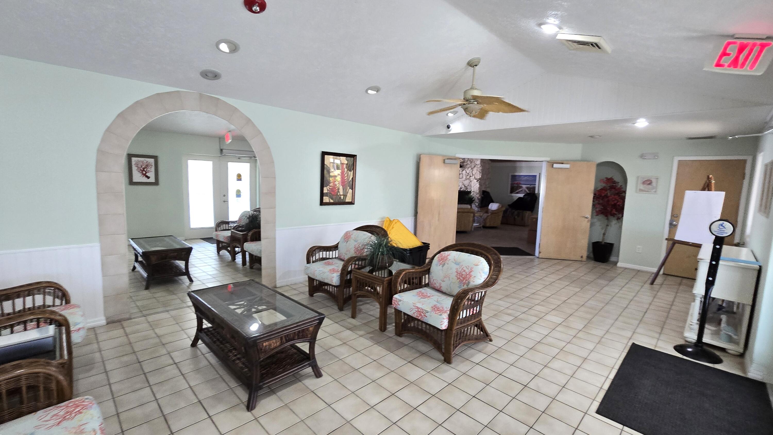 5680 Hemingway Court, Unit 15 Fort Pierce, FL 34982 - Photo 18 of 18 a living room with furniture