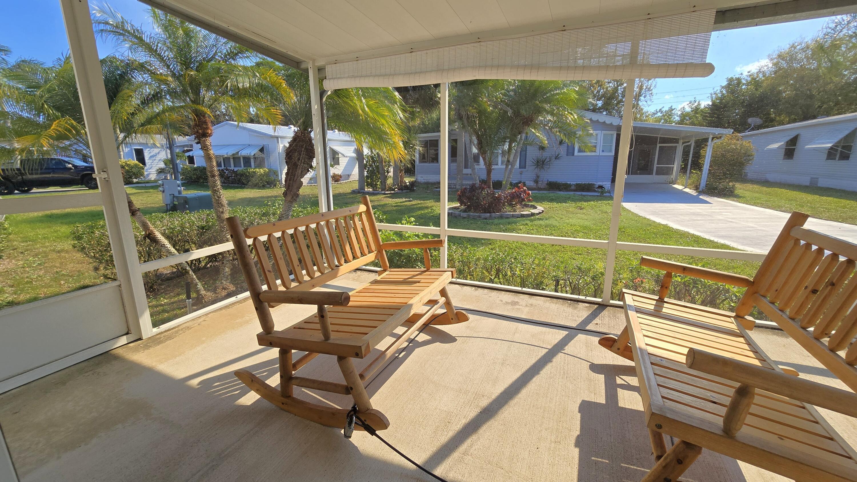 5680 Hemingway Court, Unit 15 Fort Pierce, FL 34982 - Photo 5 of 18 a view of a patio with swimming pool