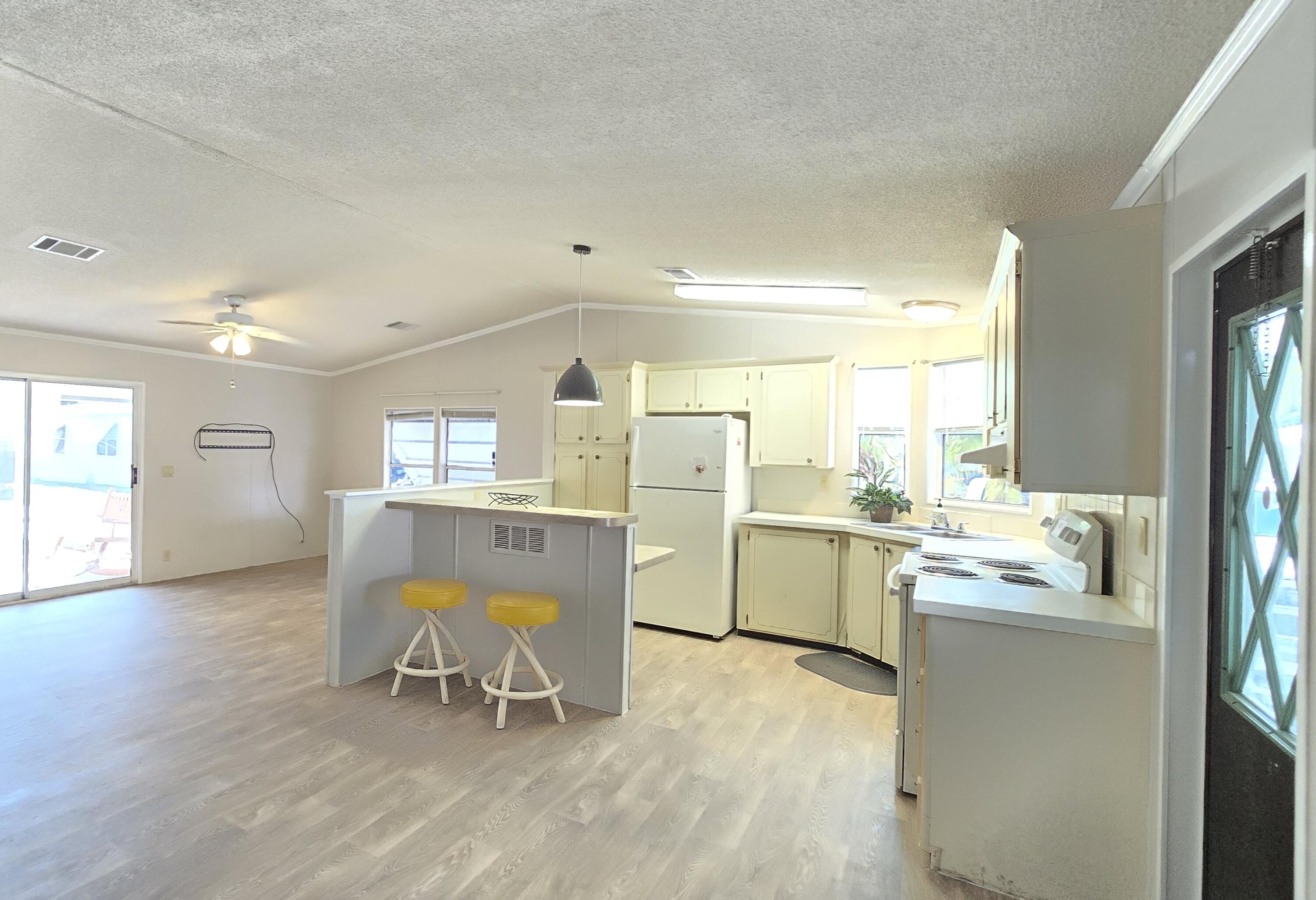 5680 Hemingway Court, Unit 15 Fort Pierce, FL 34982 - Photo 6 of 18 a room with sink and window
