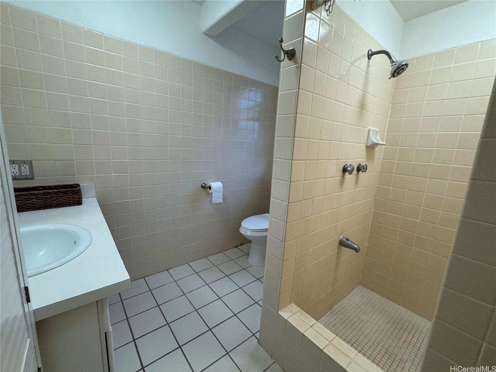 320 Hao Street Honolulu, HI 96821 - Photo 13 of 15 a bathroom with a sink and toilet