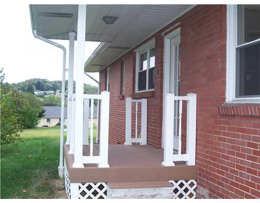 2790 Brodhead Road Aliquippa, PA 15001 - Photo 17 of 18 Facade/Exterior Front. SIDE DOOR LEADING TO THE KITCHEN.