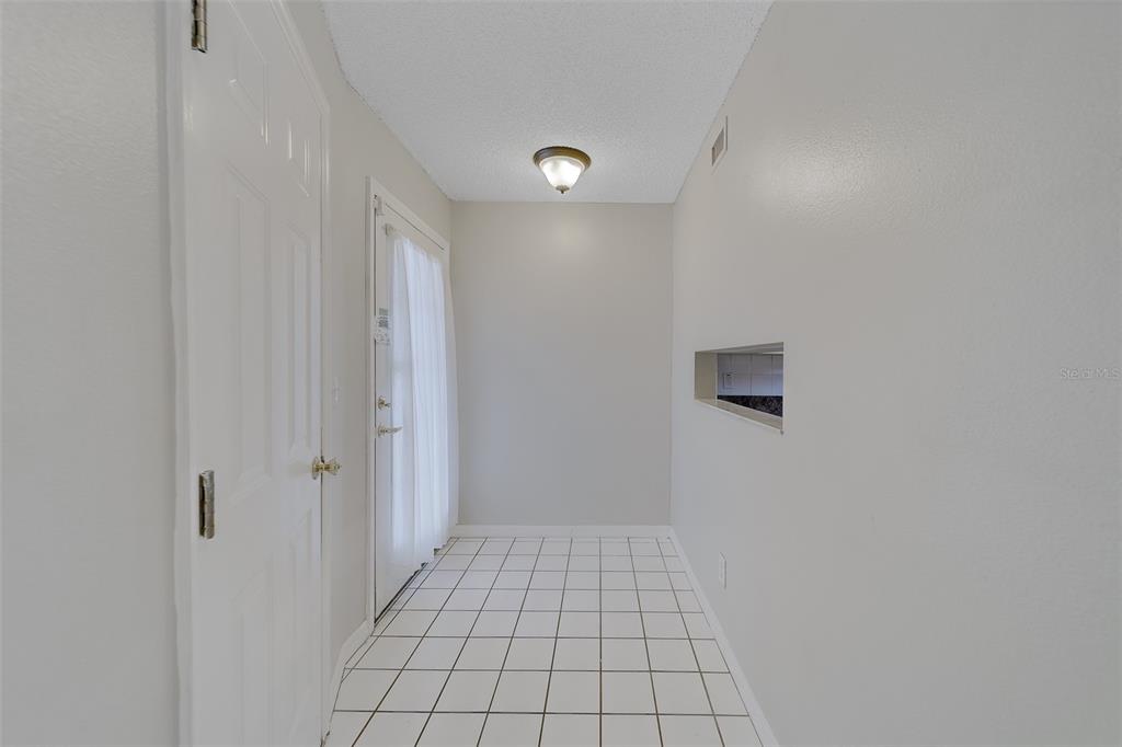 9241 Jake's Path Largo, FL 33771 - Photo 35 of 46 a view of an empty room