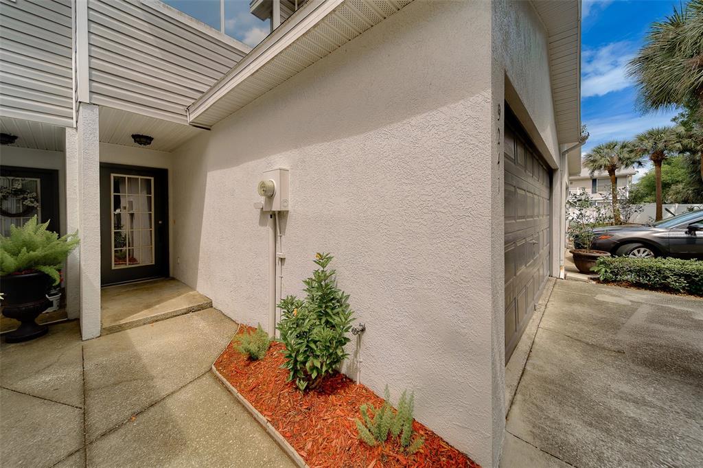 9241 Jake's Path Largo, FL 33771 - Photo 41 of 46 a view of a entryway door front of house
