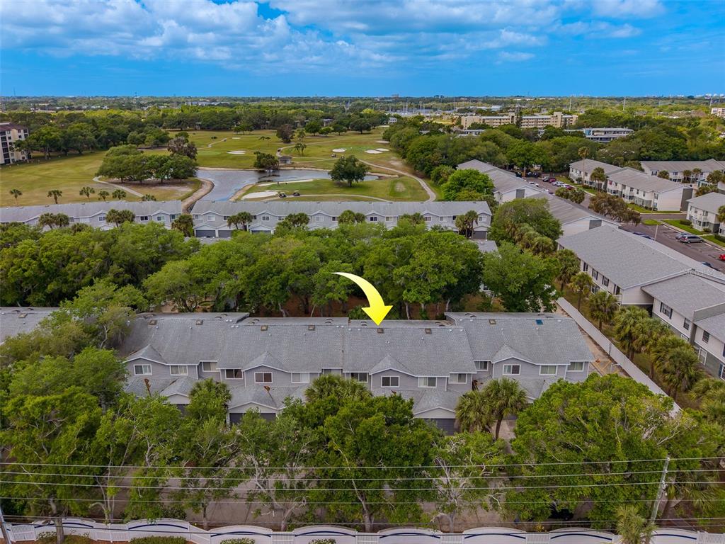 9241 Jake's Path Largo, FL 33771 - Photo 42 of 46 an aerial view of residential houses with outdoor space and river