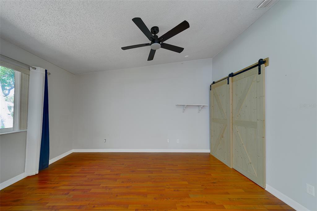 9241 Jake's Path Largo, FL 33771 - Photo 5 of 46 a view of an empty room