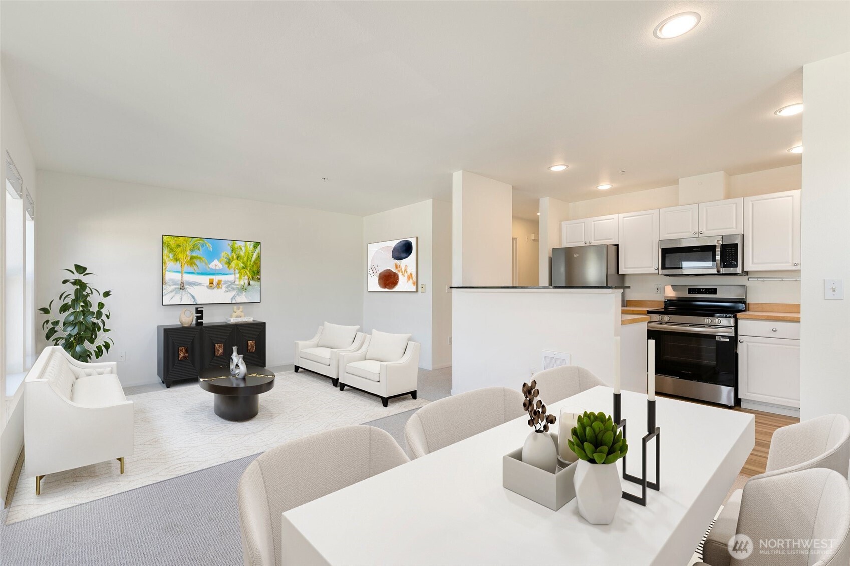 2101 North 55th Street, Unit 201 Seattle, WA 98103 - Photo 8 of 24 a kitchen with stainless steel appliances kitchen island granite countertop a refrigerator a stove a sink a dining table and chairs with wooden floor