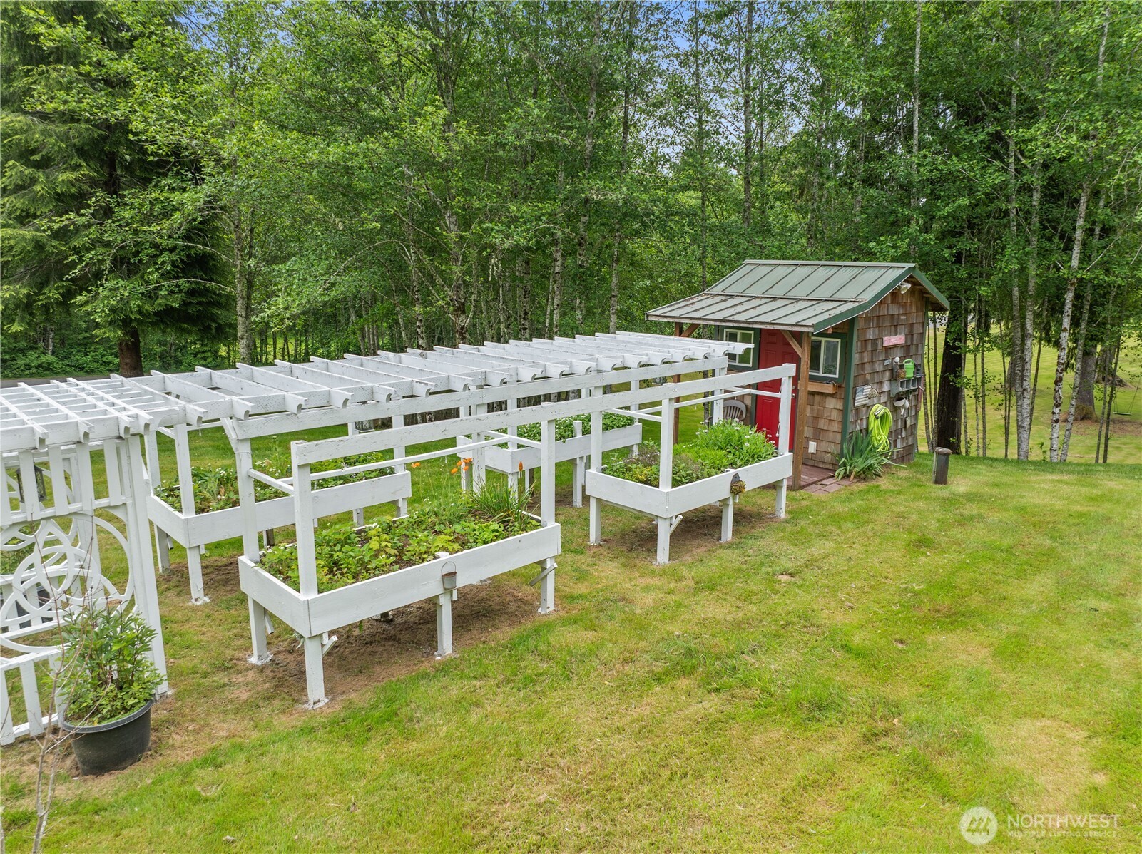 132 River Park Road Forks, WA 98331 - Photo 36 of 40 a view of a patio with table and chairs