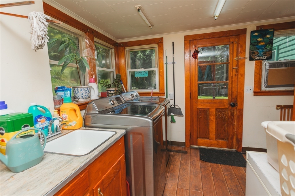 21 River Street Colrain, MA 01340 - Photo 18 of 28 a kitchen with a sink a stove and a refrigerator