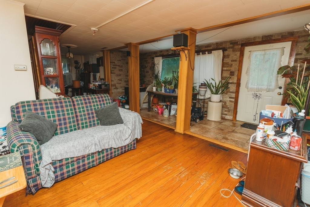 21 River Street Colrain, MA 01340 - Photo 7 of 28 a living room with a couch