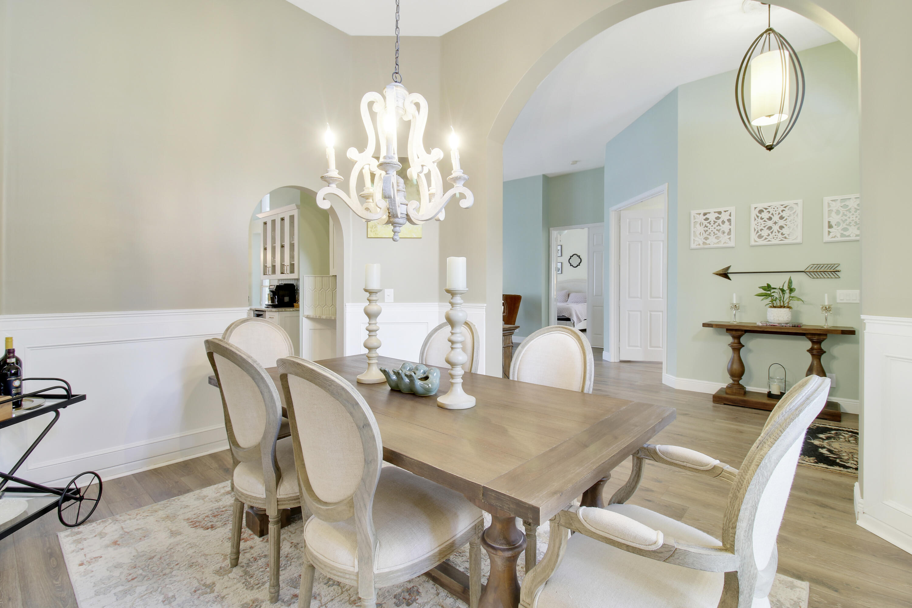 799 Cedar Cove Road Wellington, FL 33414 - Photo 12 of 44 a view of a dining room with furniture and chandelier