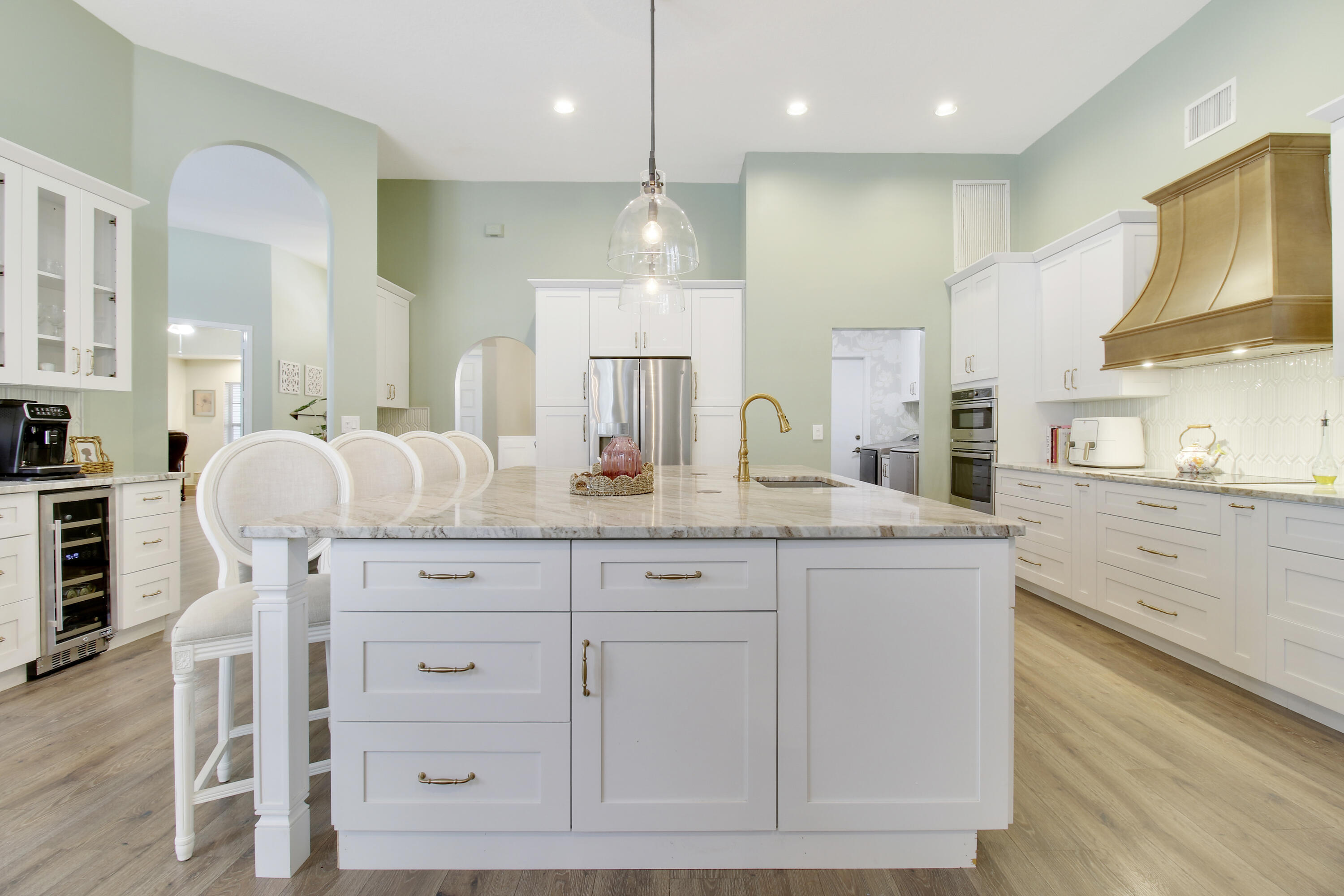 799 Cedar Cove Road Wellington, FL 33414 - Photo 17 of 44 a spacious bathroom with a granite countertop sink a mirror and a