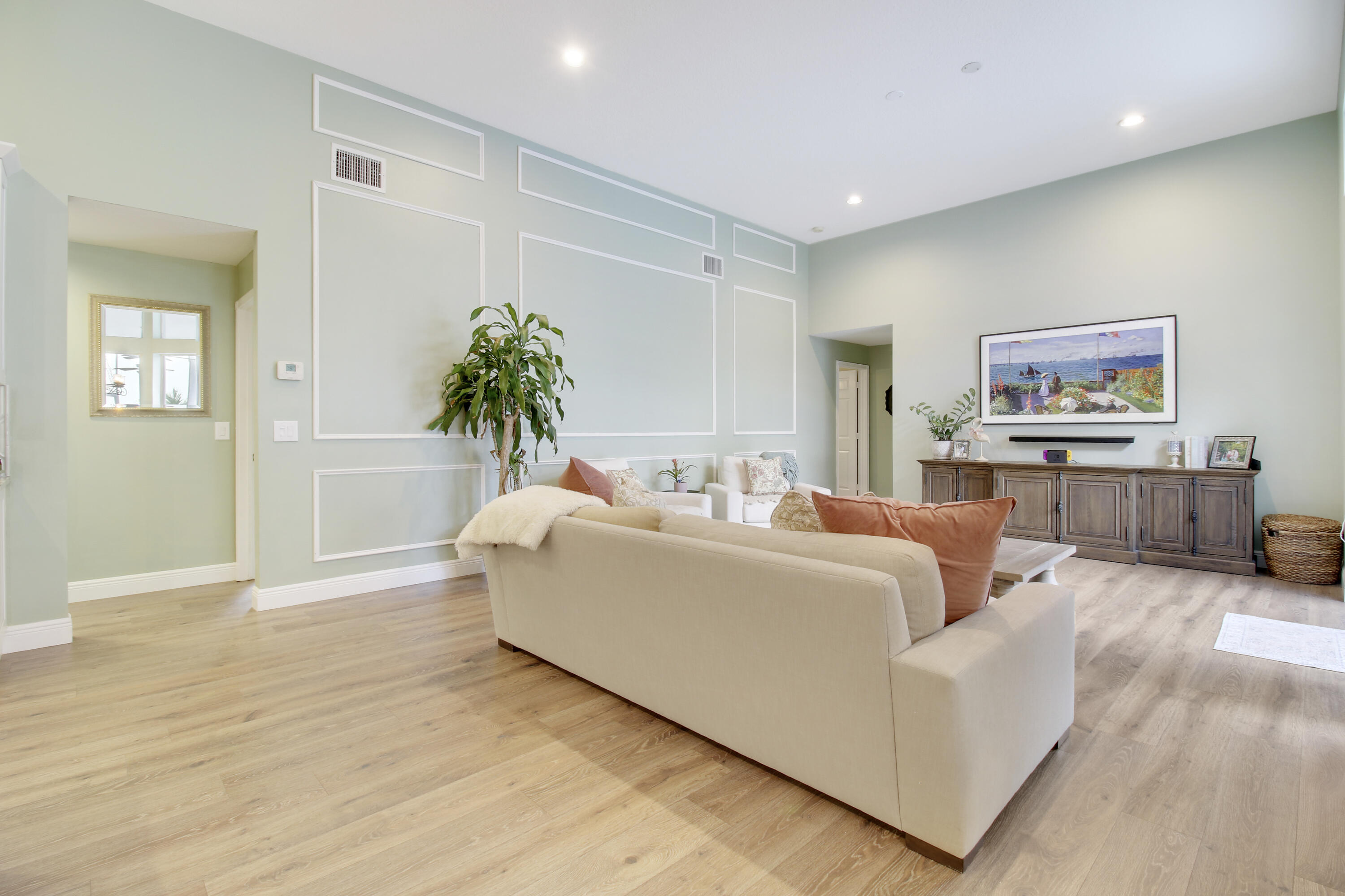 799 Cedar Cove Road Wellington, FL 33414 - Photo 22 of 44 a living room with furniture and a potted plant