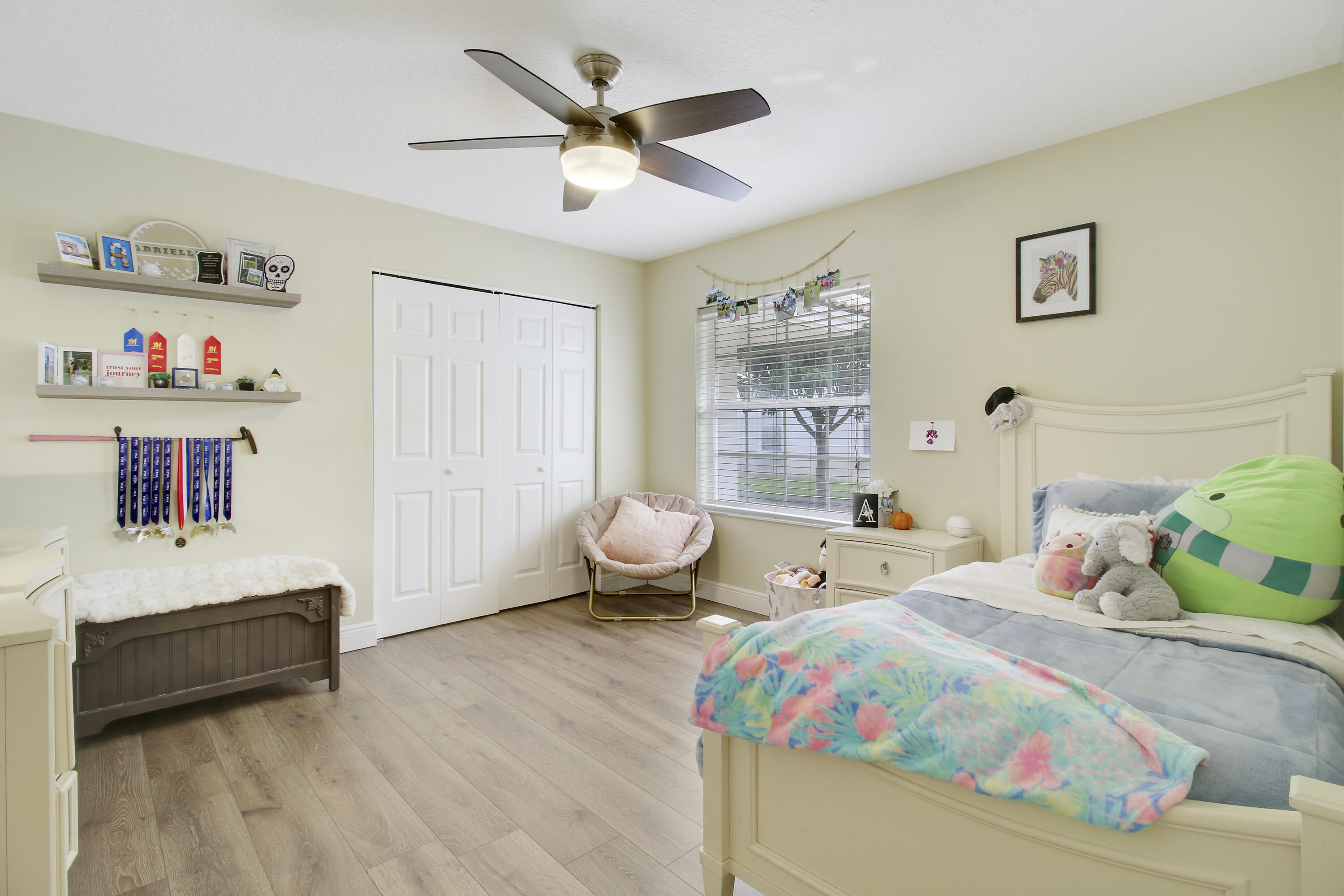 799 Cedar Cove Road Wellington, FL 33414 - Photo 26 of 44 a bedroom with furniture and a large window