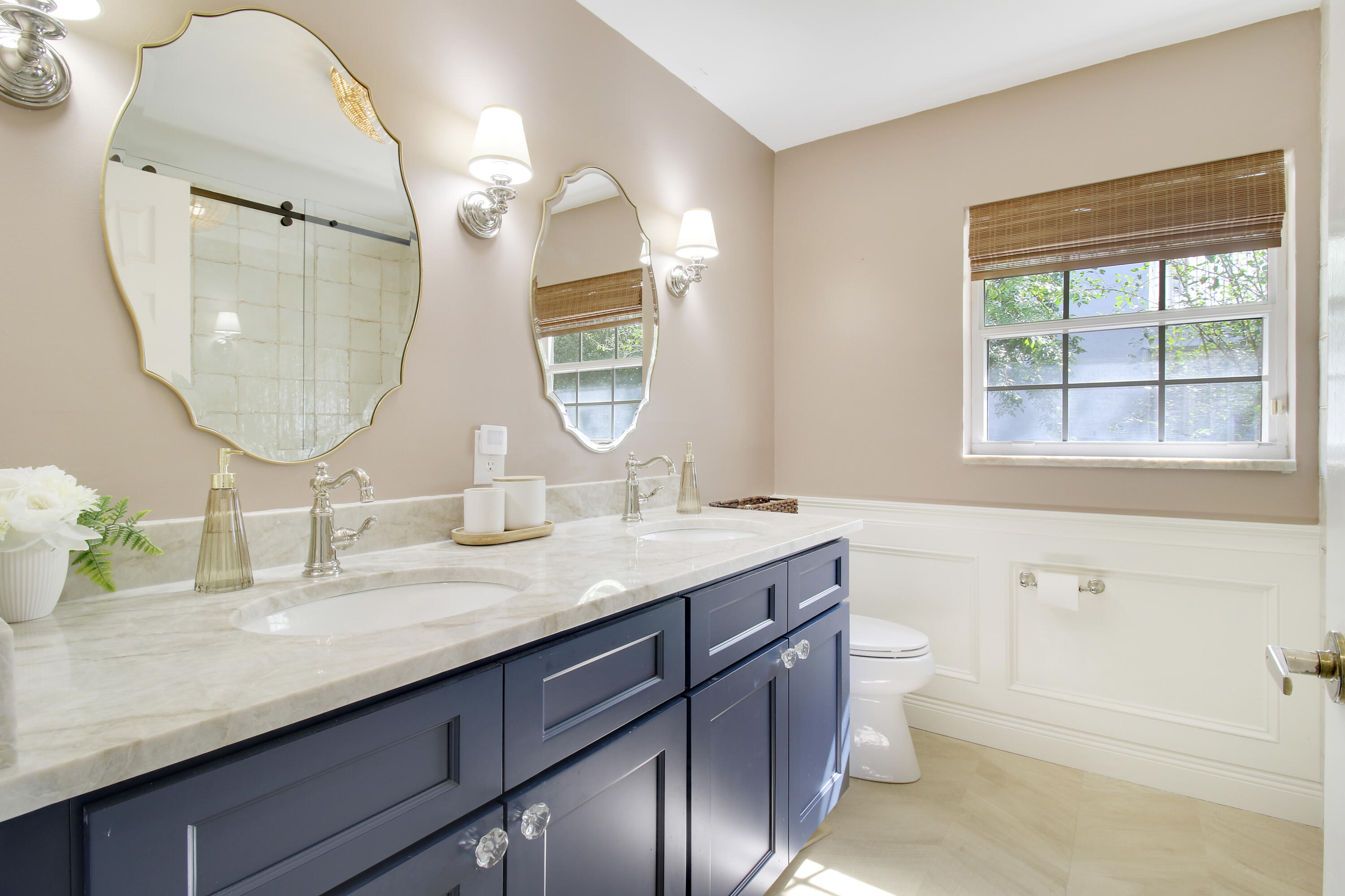 799 Cedar Cove Road Wellington, FL 33414 - Photo 27 of 44 a bathroom with a granite countertop bathtub a sink and a mirror