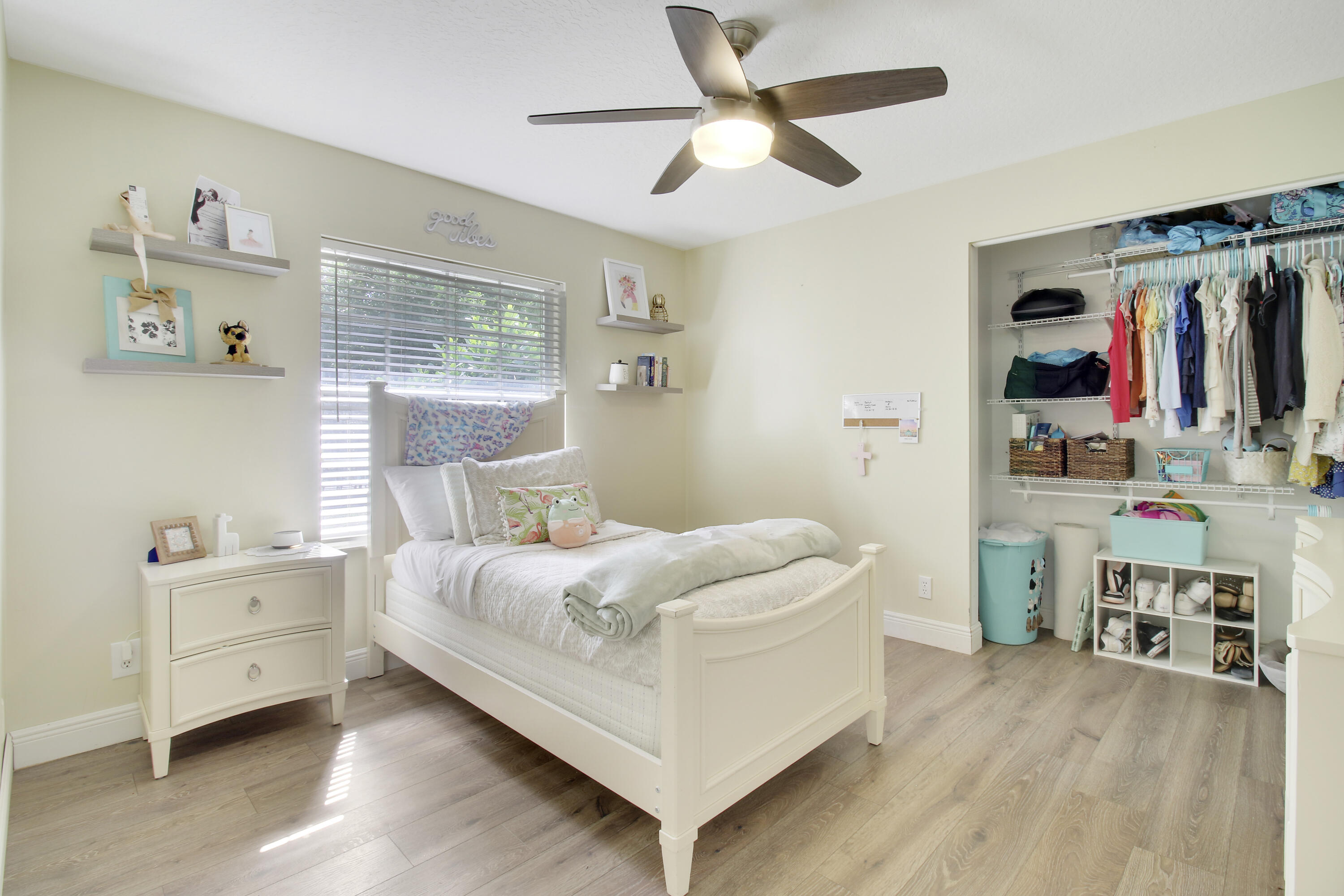 799 Cedar Cove Road Wellington, FL 33414 - Photo 29 of 44 a bed room with a bed and a window