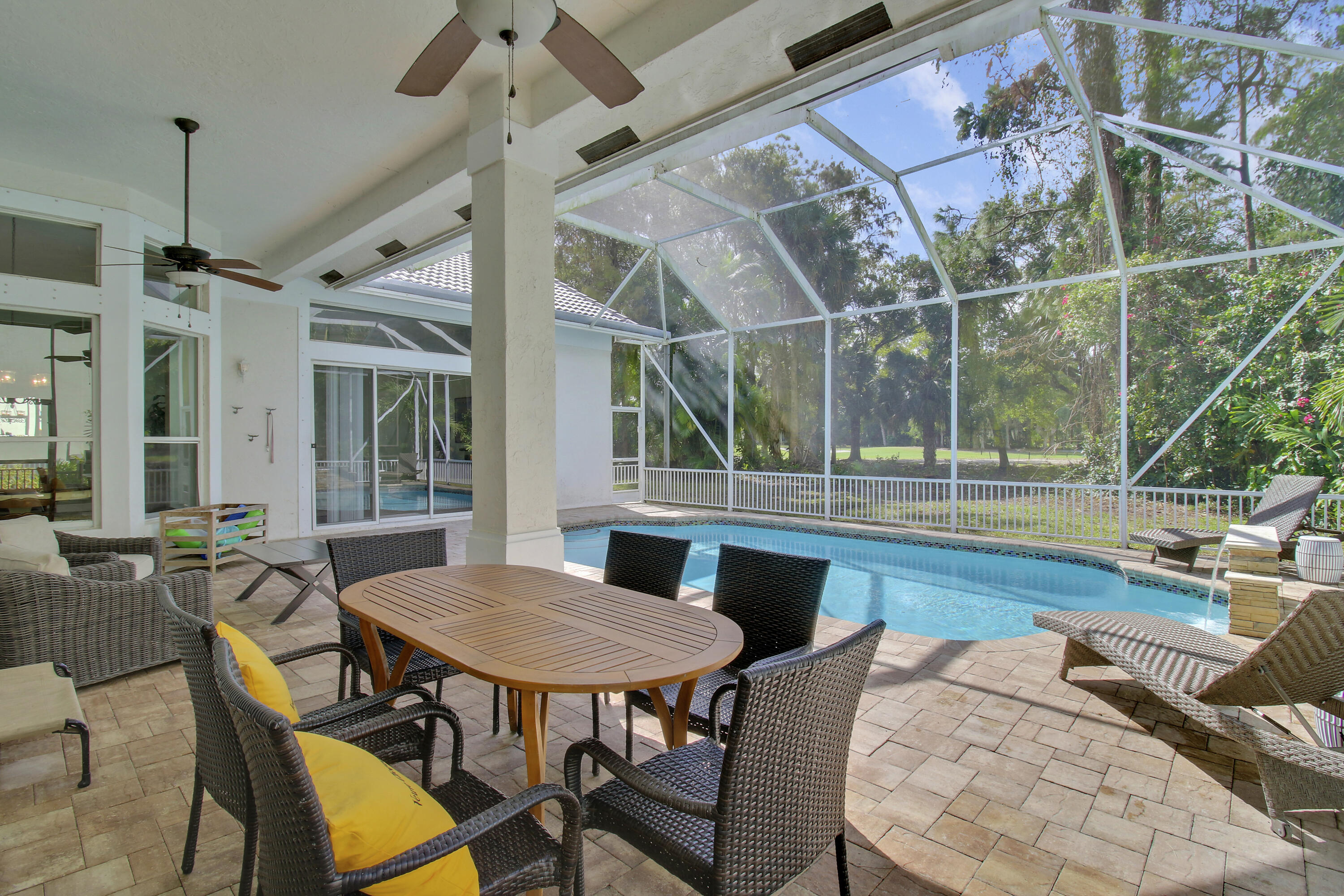 799 Cedar Cove Road Wellington, FL 33414 - Photo 34 of 44 a view of a dining room with furniture window and outside view