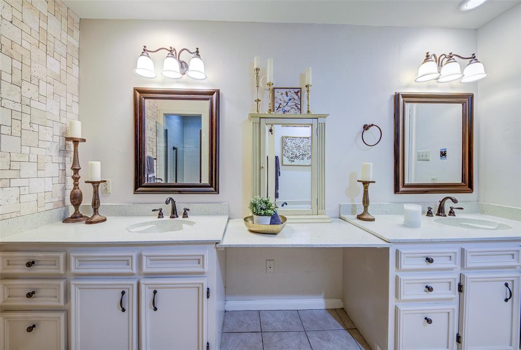 3602 Soft Wind Court Grapevine, TX 76051 - Photo 18 of 31 Bathroom featuring double vanity and tile patterned floors