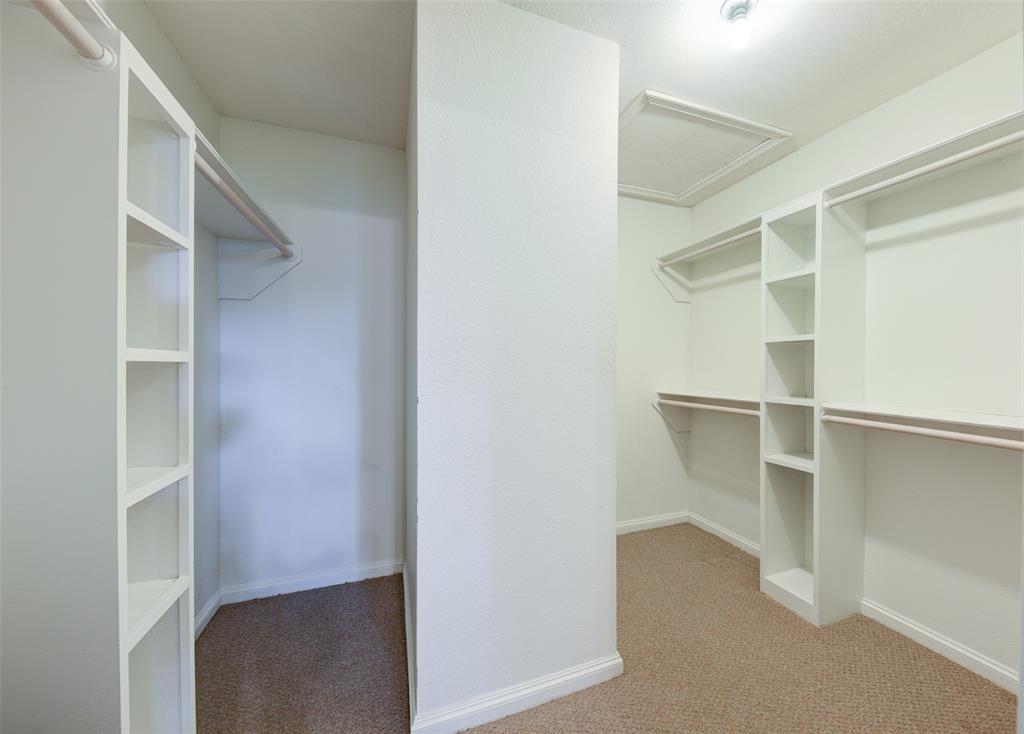3602 Soft Wind Court Grapevine, TX 76051 - Photo 23 of 31 Spacious closet featuring carpet flooring and attic access