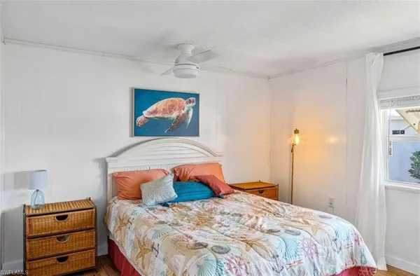 a bedroom with a bed and a closet