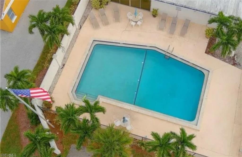 407 Cape Florida Way Naples, FL 34104 - Photo 26 of 27 View of community pool