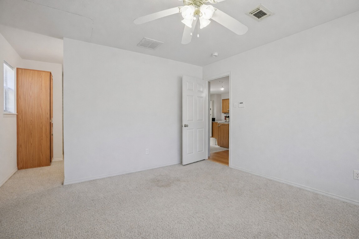 2001 Goforth Road Kyle, TX 78640 - Photo 11 of 34 an empty room with a bathroom