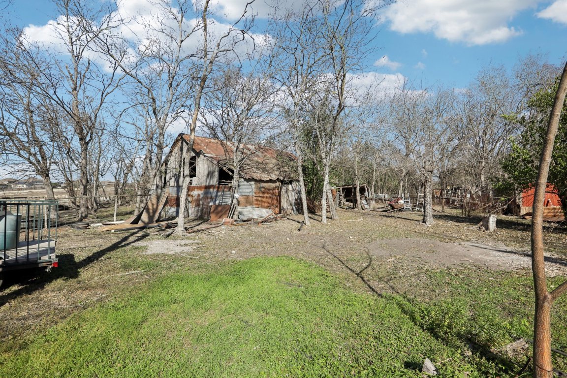 2001 Goforth Road Kyle, TX 78640 - Photo 24 of 34 a view of a yard with a tree