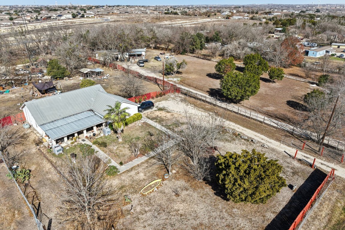 2001 Goforth Road Kyle, TX 78640 - Photo 34 of 34 an aerial view of a house with a yard and lake view