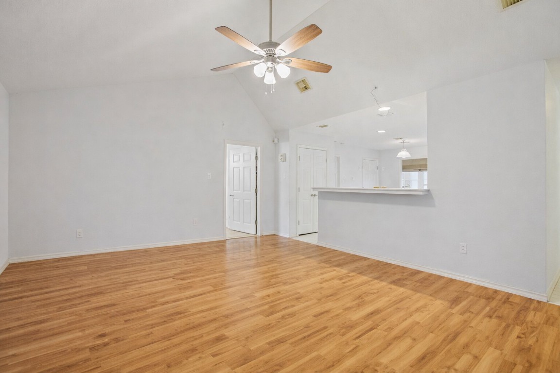 2001 Goforth Road Kyle, TX 78640 - Photo 8 of 34 a view of an empty room with a ceiling fan