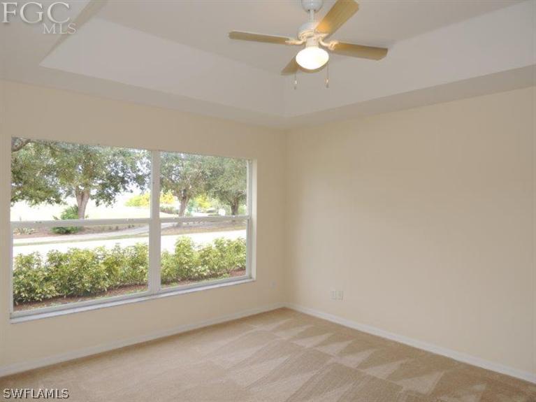 2280 Somerset Ridge Drive, Unit 101 Lehigh Acres, FL 33973 - Photo 4 of 12 an empty room with a window