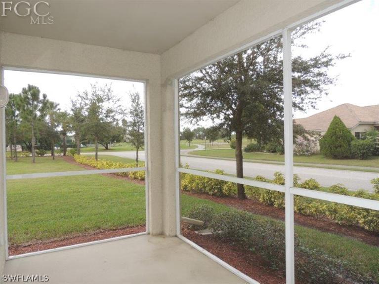 2280 Somerset Ridge Drive, Unit 101 Lehigh Acres, FL 33973 - Photo 10 of 12 a view of outdoor space with backyard