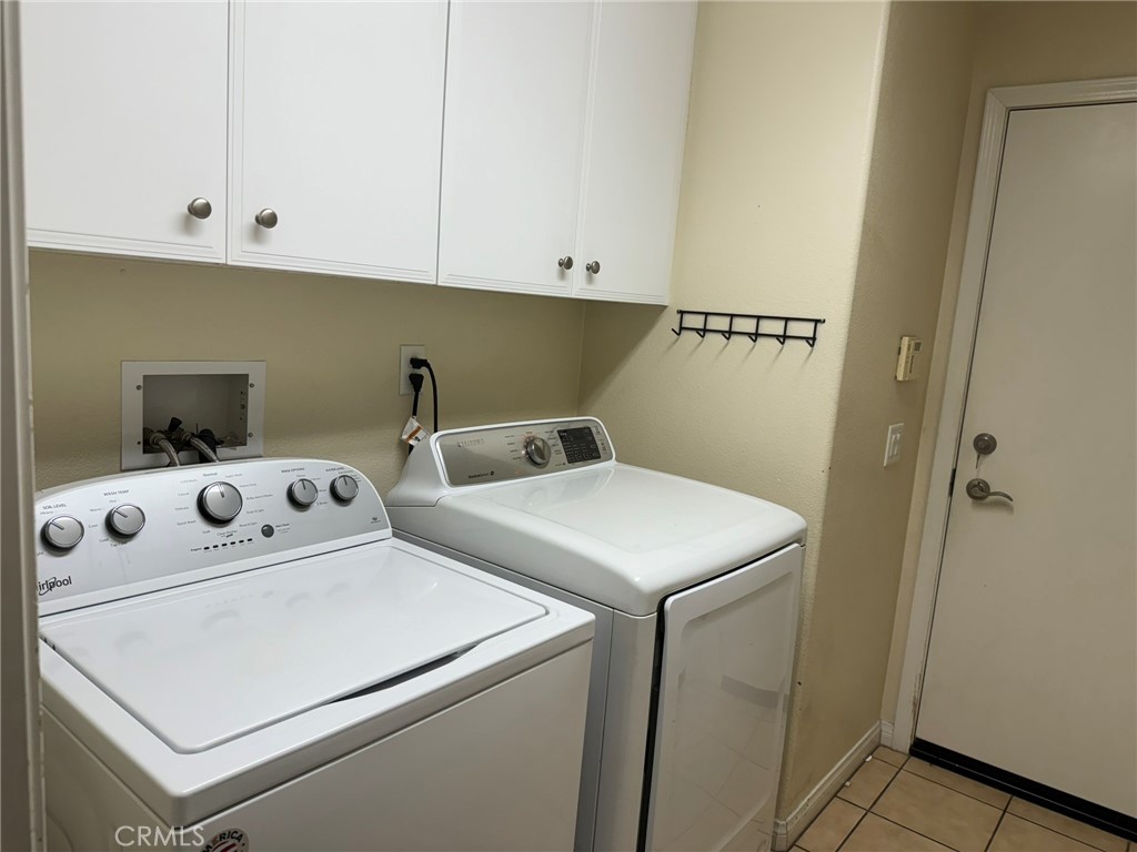 62 Shadowplay Irvine, CA 92620 - Photo 12 of 44 a utility room with dryer and washer