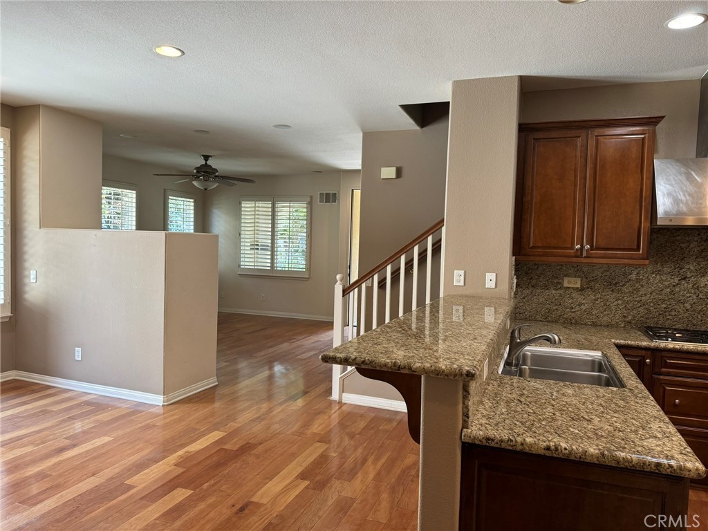 62 Shadowplay Irvine, CA 92620 - Photo 14 of 44 workspace with wooden floor and windows