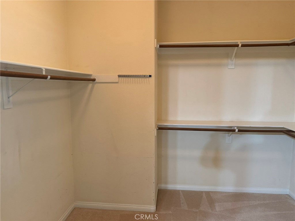 62 Shadowplay Irvine, CA 92620 - Photo 24 of 44 a view of an empty walk in closet